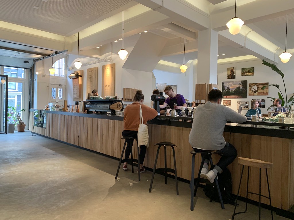 The long coffee bar at Bocca with bar stools along the counter